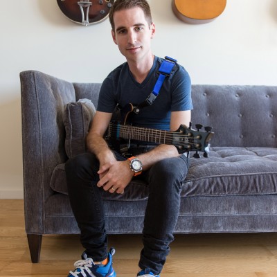 Seated on Sofa with Guitar - Color